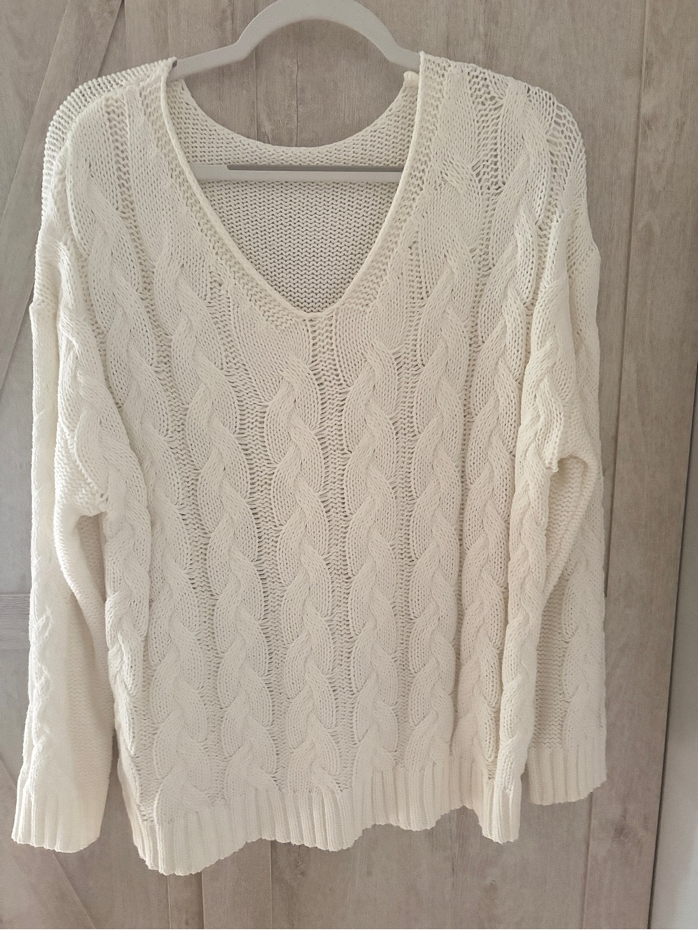 Cream Cable Knit V‑Neck Sweater